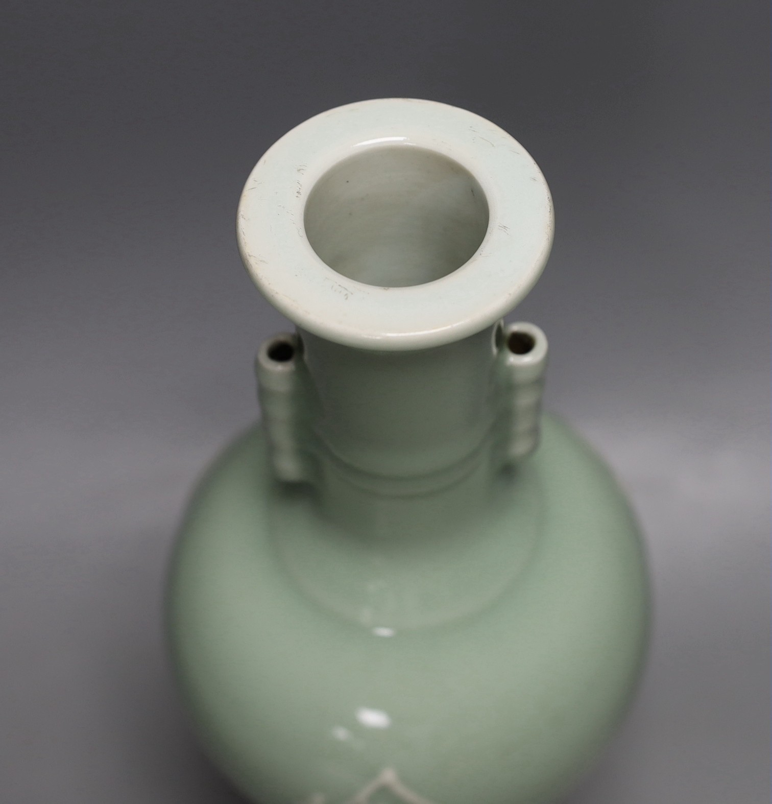 A Chinese slip decorated celadon ground arrow vase 28cm